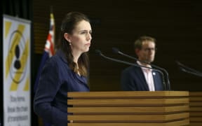 Prime Minister Jacinda Ardern and Director-General of Health Ashley Bloomfield during a press conference at Parliament on 5 April 2020. New Zealand was placed in complete lockdown and a state of national emergency was declared on Thursday 26 March to stop the spread of COVID-19 across the country.