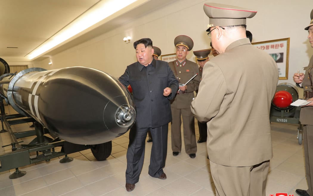 North Korean leader Kim Jong Un inspects a nuclear weaponisation project at an unknown location in North Korea.