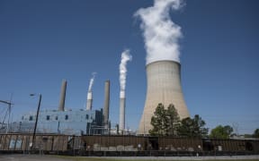 Steam rises from the Miller coal Power Plant in Adamsville, Alabama, 13 April 2021.