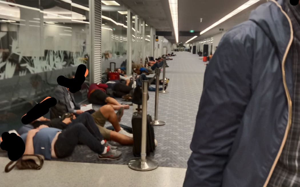More than 100 passengers transiting through Auckland Airport were forced to wait in a cold corridor overnight  on 2 September, 2022.
