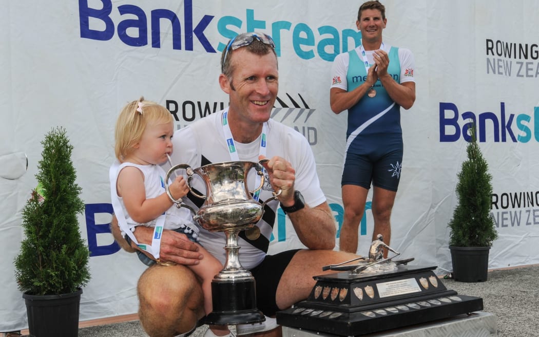 Mahe Drysdale and daughter Bronte display the cup.