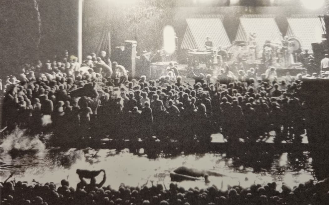 Fans invade the stage during Split Enz 1983 concert at the Bowl of Brooklands.