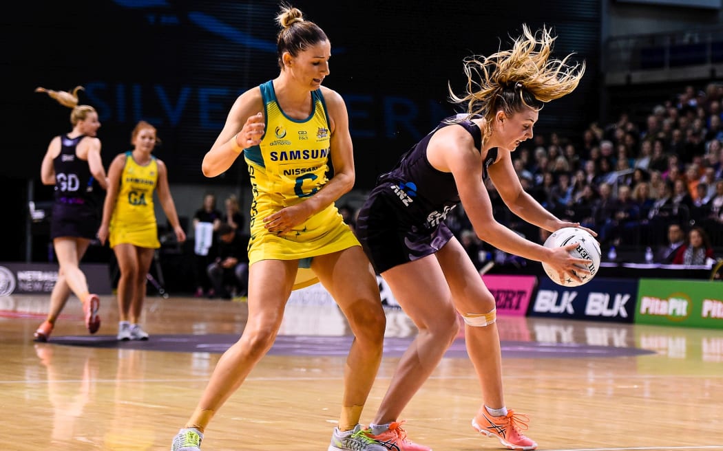 Gina Crampton of the Silver Ferns gets the ball from Kim Ravaillion of the Diamonds during the Constellation Cup netball match 2017.