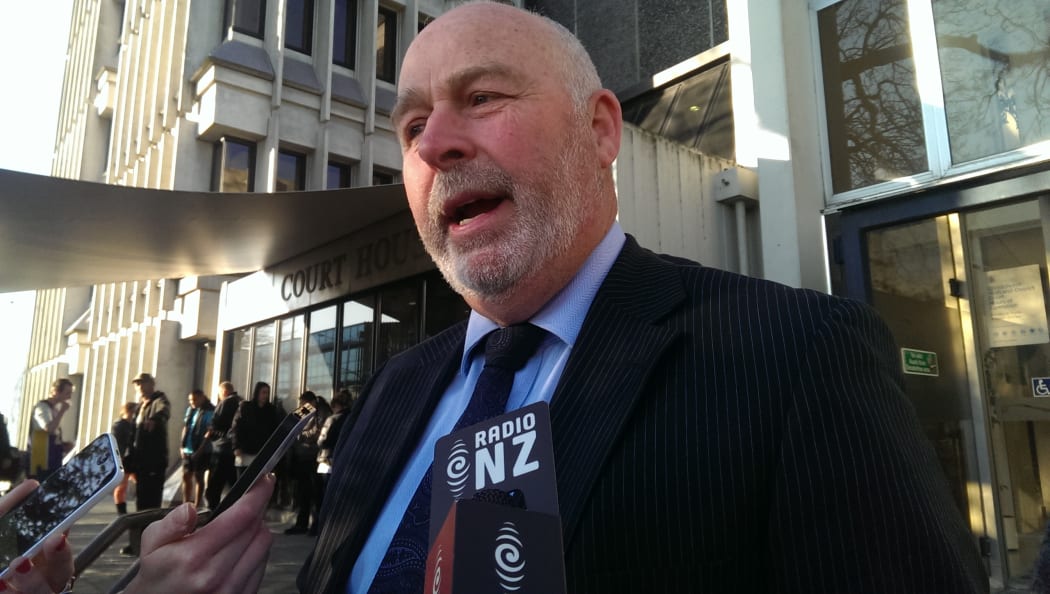 LPC chair Trevor Burt addresses reporters outside court today.