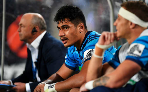 Blues Tanielu Tele'a after receiving a red card.