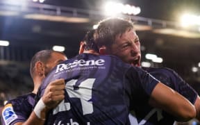Cam Roigard celebrates with Ngatungane Punivai.