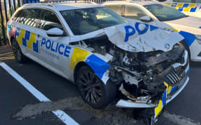 A man is facing serious charges after allegedly ramming a police car with a stolen vehicle in Auckland overnight Tuesday.