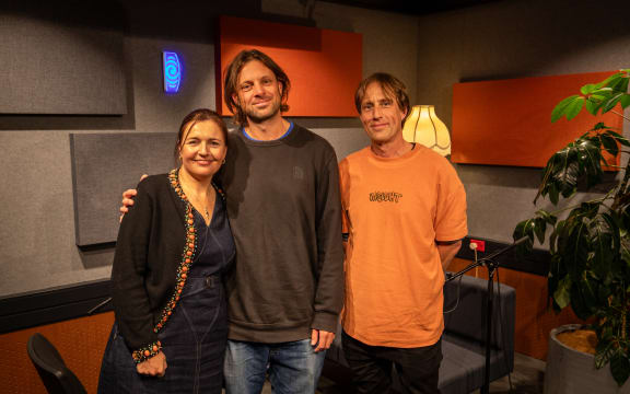 RNZ's Charlotte Ryan with Sam Trevethick and Nick Robinson of the New Zealand band Shapeshifter