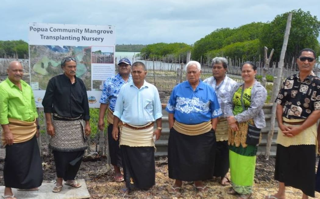 Members of some of the Community Management Committee (made up of representatives from 26 surrounding villages) visiting mangrove replanting sites on the Fanga'uta Lagoon Catchment.
