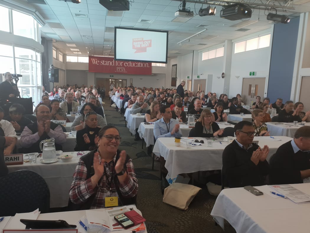 PPTA conference delegates applaud a speaker, October 2018.
