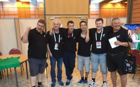 The New Zealand men's bridge team, 'Bridge Blacks' shortly after learning they are through to the semi-finals.