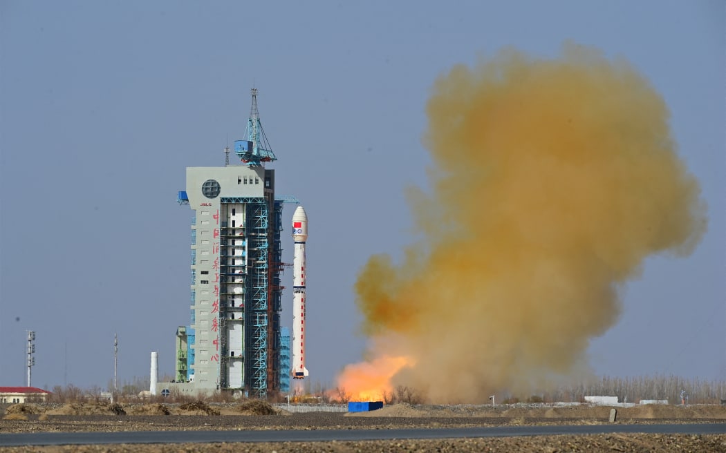 A Long March-4B rocket carrying the Fengyun-3 07 satellite blasts off from the Jiuquan Satellite Launch Center in northwest China, April 16, 2023. China on Sunday morning launched a Long March-4B rocket to place a new meteorological satellite in space.