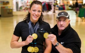 New Zealand Paralympic swimmer Sophie Pascoe and her coach Roly Crichton.