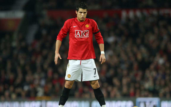 S) In this file photo taken on January 01, 2008 Manchester United's Portuguese midfielder Cristiano Ronaldo prepares to take a free kick against Birmingham City during their English Premiership football match at Old Trafford in Manchester, north-west England, 01 January 2008.