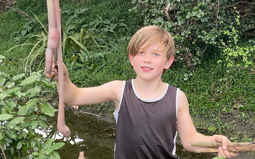 Barnaby Domigan discovered a giant earthworm in his back yard in Christchurch.