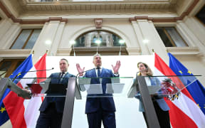 Austrian politicians giving a media conference updating about now-collapsed talks on forming a new government.