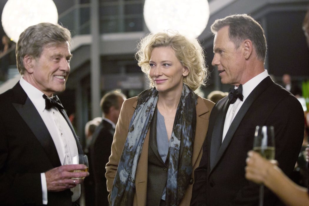 Blanchett (Mary Mapes) and Bruce Greenwood (CBS News Chief Andrew Heyward) during cocktail hour in James Vanderbilt’s Truth