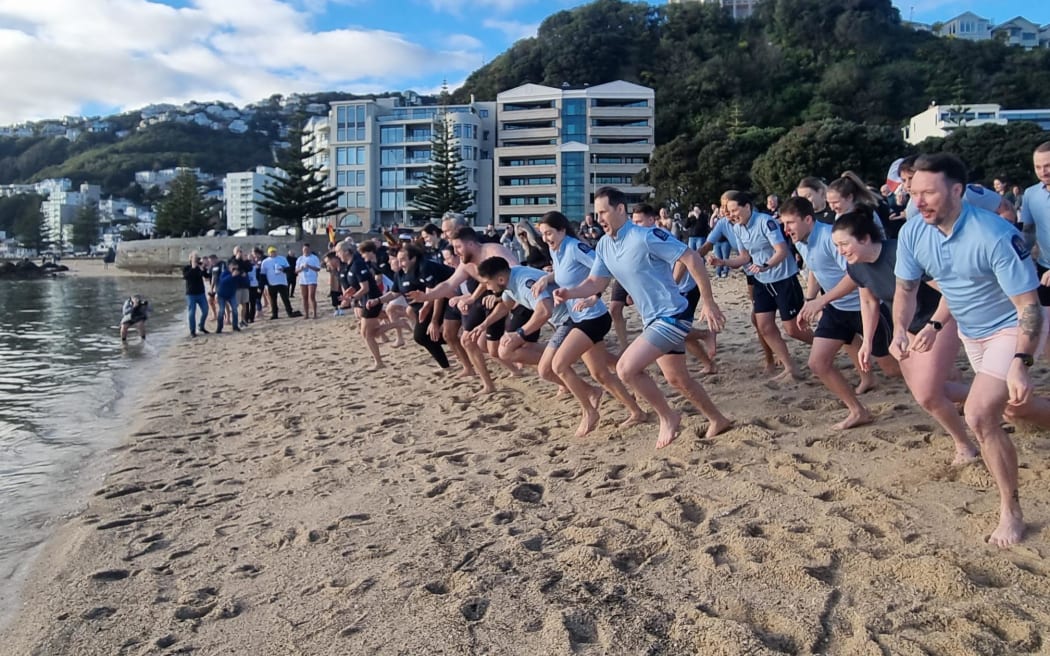 The first wave of plungers get set to hit the water.