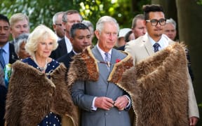 Prince Charles and Camilla wear korowai presented to the the Queen and Prince Philip on their New Zealand tour in 1954.