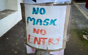 Sign saying "No Mask No Entry"