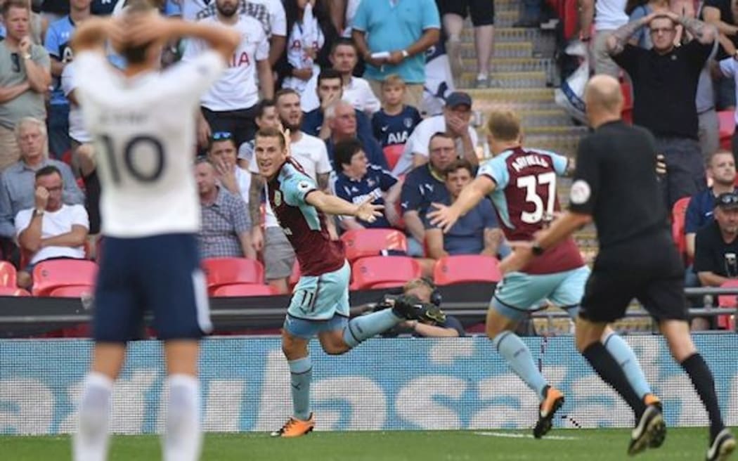 Chris Wood celebrates his first premier league goal for Burnley.