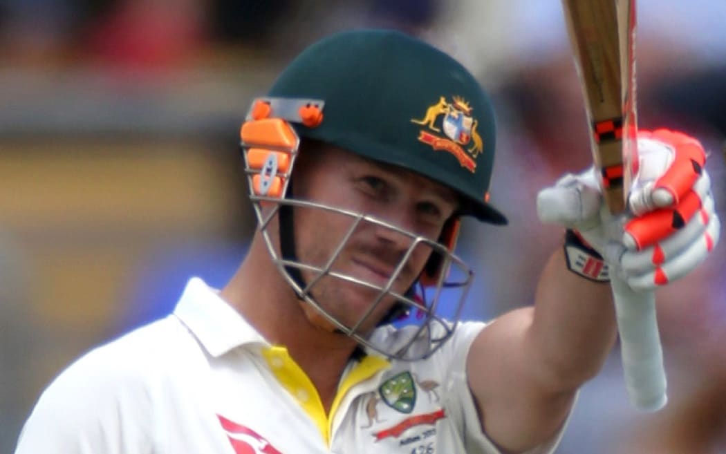 The Australia batsman David Warner celebrates his half century.