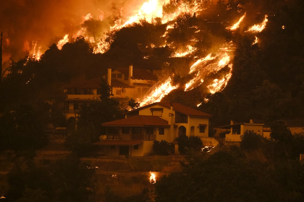 Sixth consecutive day of the wildfire at Evia Island, on August 8, 2021.