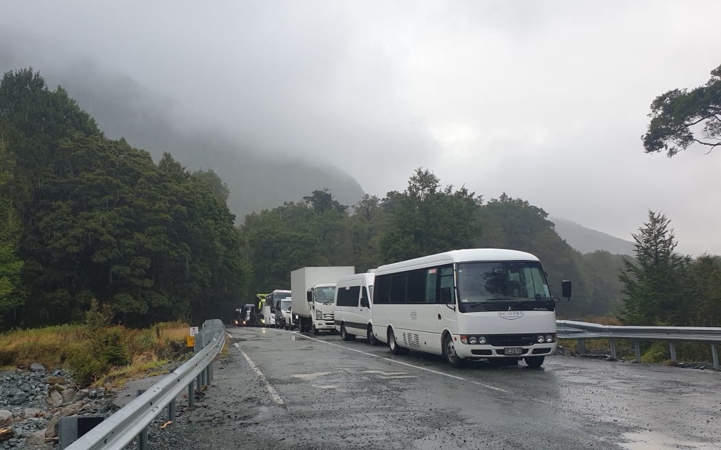 Buses line up as they prepare to drive the Milford Road.