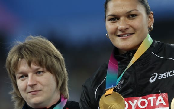 Gold medalist Valerie Adams with silver medalist Nadzeya Ostapchuk at the 2011 IAAF World Championships in South Korea.