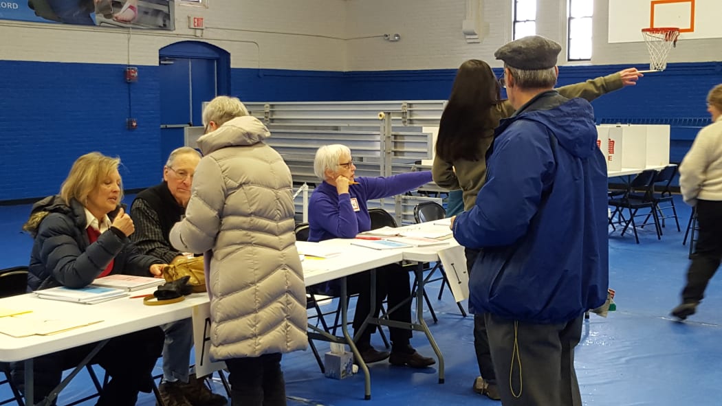 Voters prepare to cast their ballots in Concord