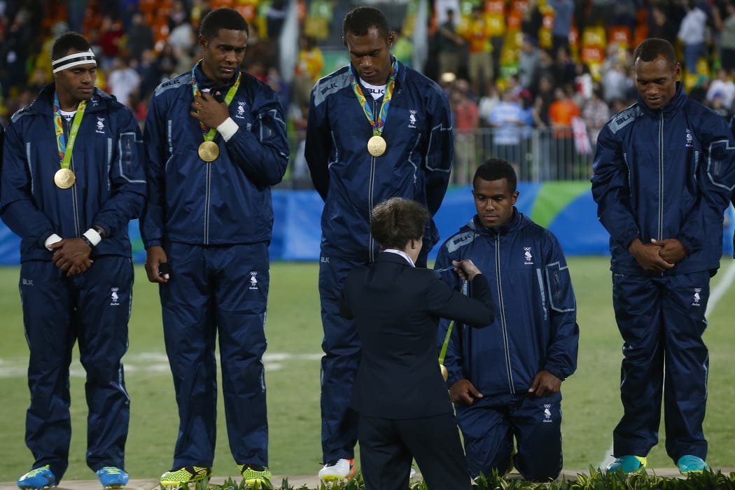The Fiji men's rugby sevens team won the country its first-ever Olympic medal, easily beating Great Britain in the final.