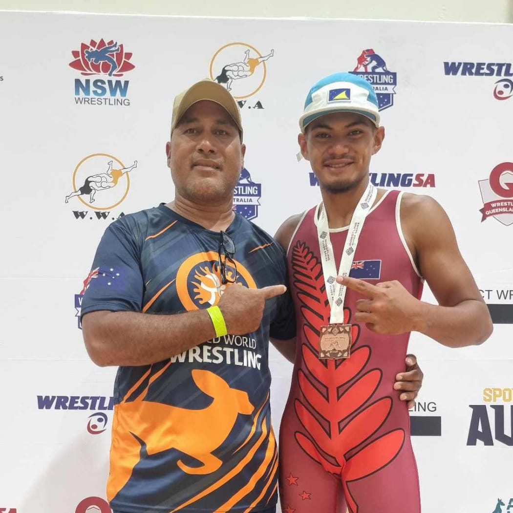 Coach Iosefa and Mosemalie Kaio after award ceremony Australia Super Series 2025.