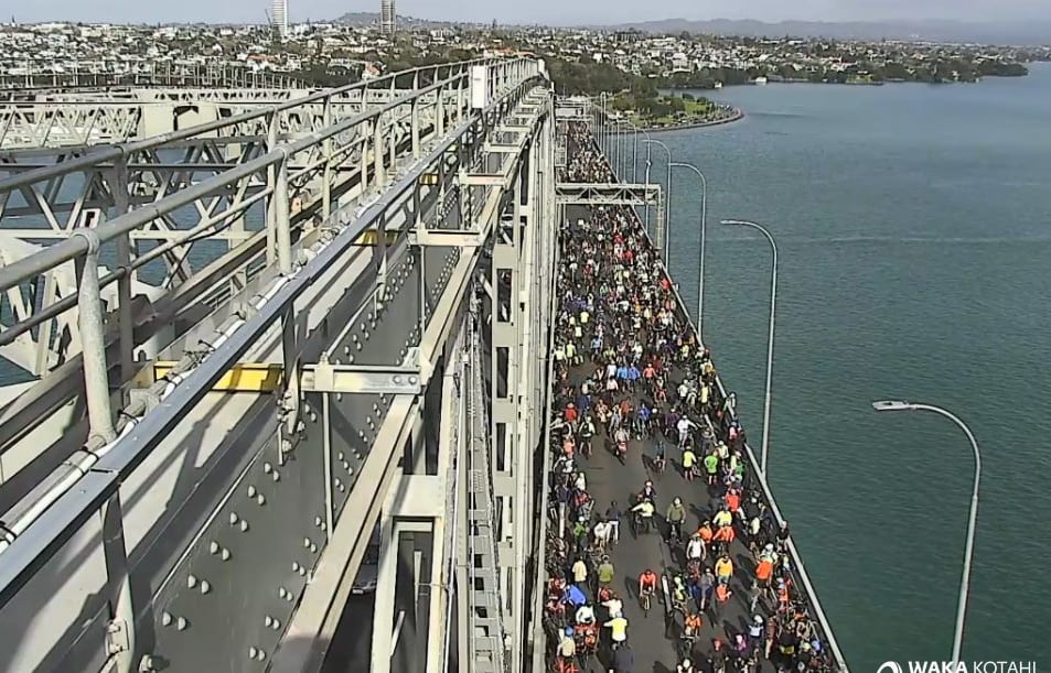 The cyclists on the bridge