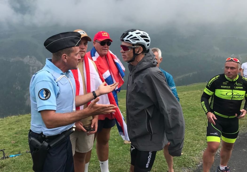 Chris Froome was mistaken by police for a fan, Froome's wife said.