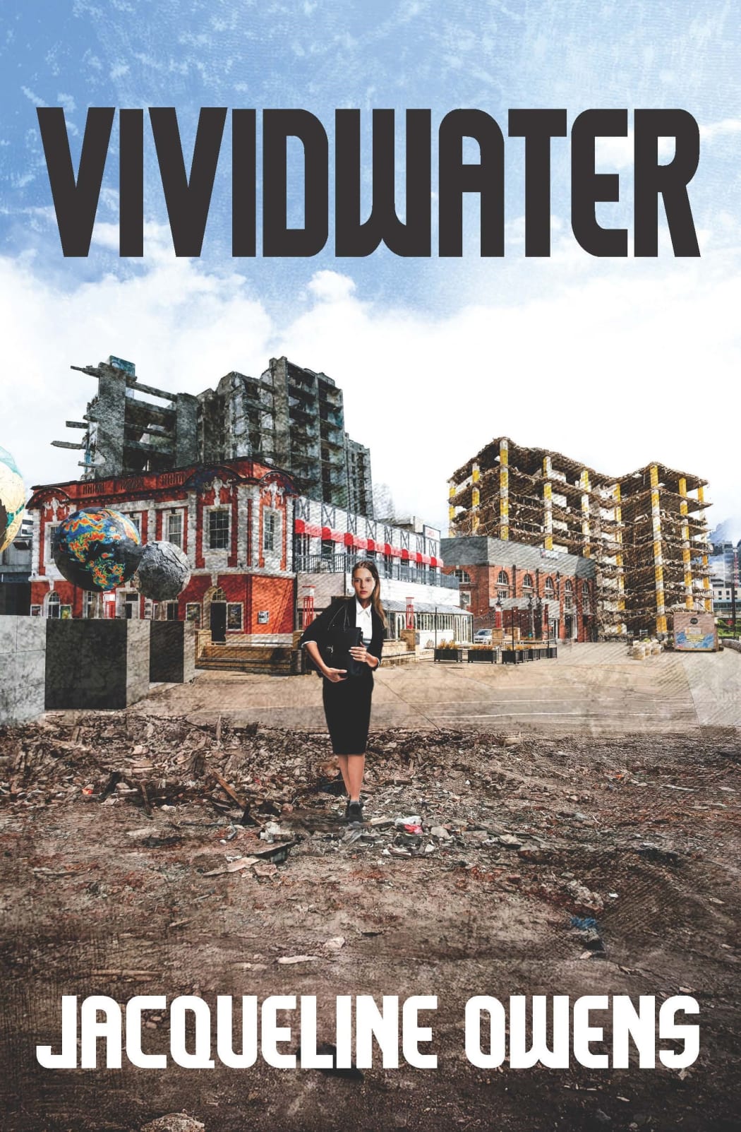 The cover of the book 'Vividwater'. It shows a desolate wasteland dotted with tall old buildings, and a woman in business clothes standing out front.