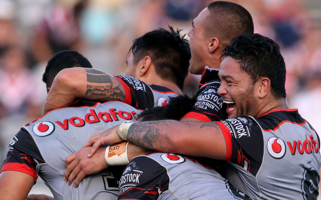 The Warriors celebrate their golden-point victory.