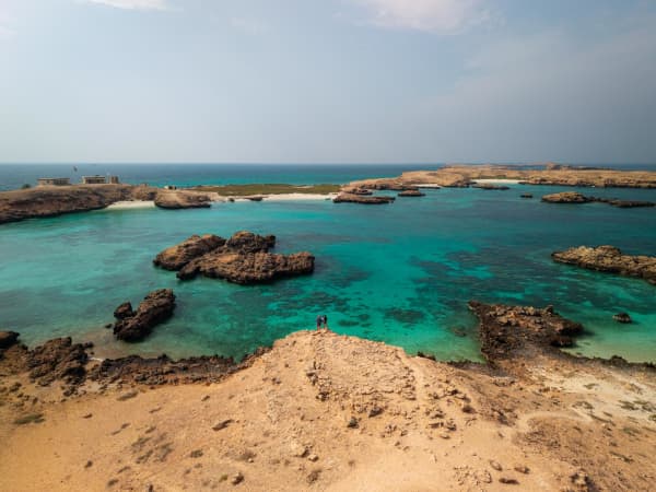 Mike and Maria McCollam with their daughter, Ella, in Oman, where they will be spending Christmas in 2025.