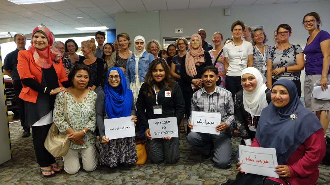 Members of New Zealand's Syrian community gather to welcome new refugee arrivals to Wellington on 26 February 2016.