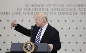 President Donald Trump addresses staff at the CIA headquarters.