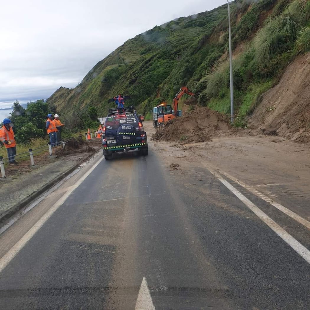 The slip at SH59 in Pukerua Bay has been partly cleared.