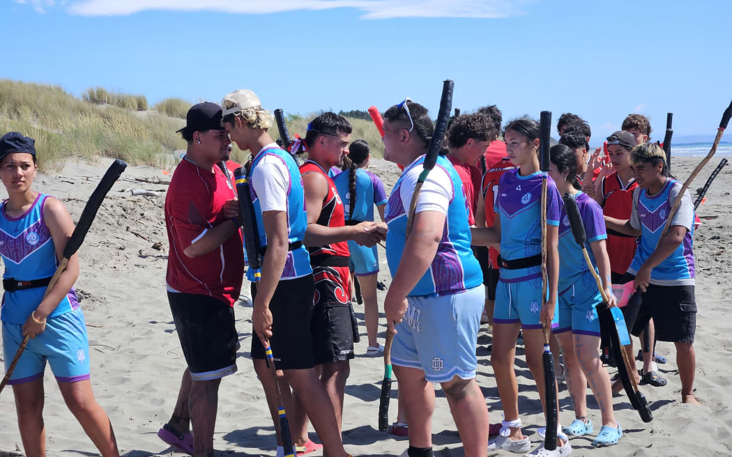 Students at Wiki Hā hongi after a game of Hopu i te Ariki.