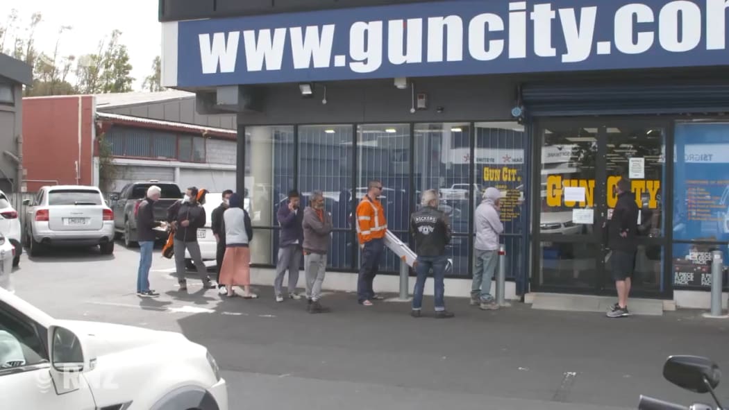 Queues at Gun City as New Zealand prepares for Covid-19 lockdown.