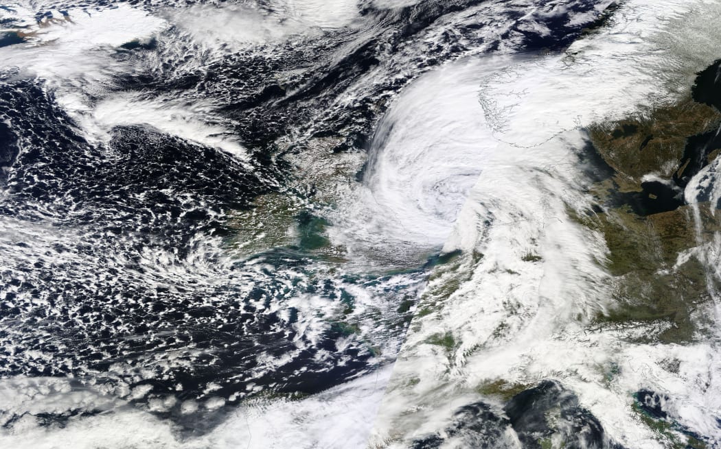 A satellite image retrieved from Nasa's Earth Observing System Data and Information System shows Storm Katie just off the southeast coast of Britain after passing over southern England.
