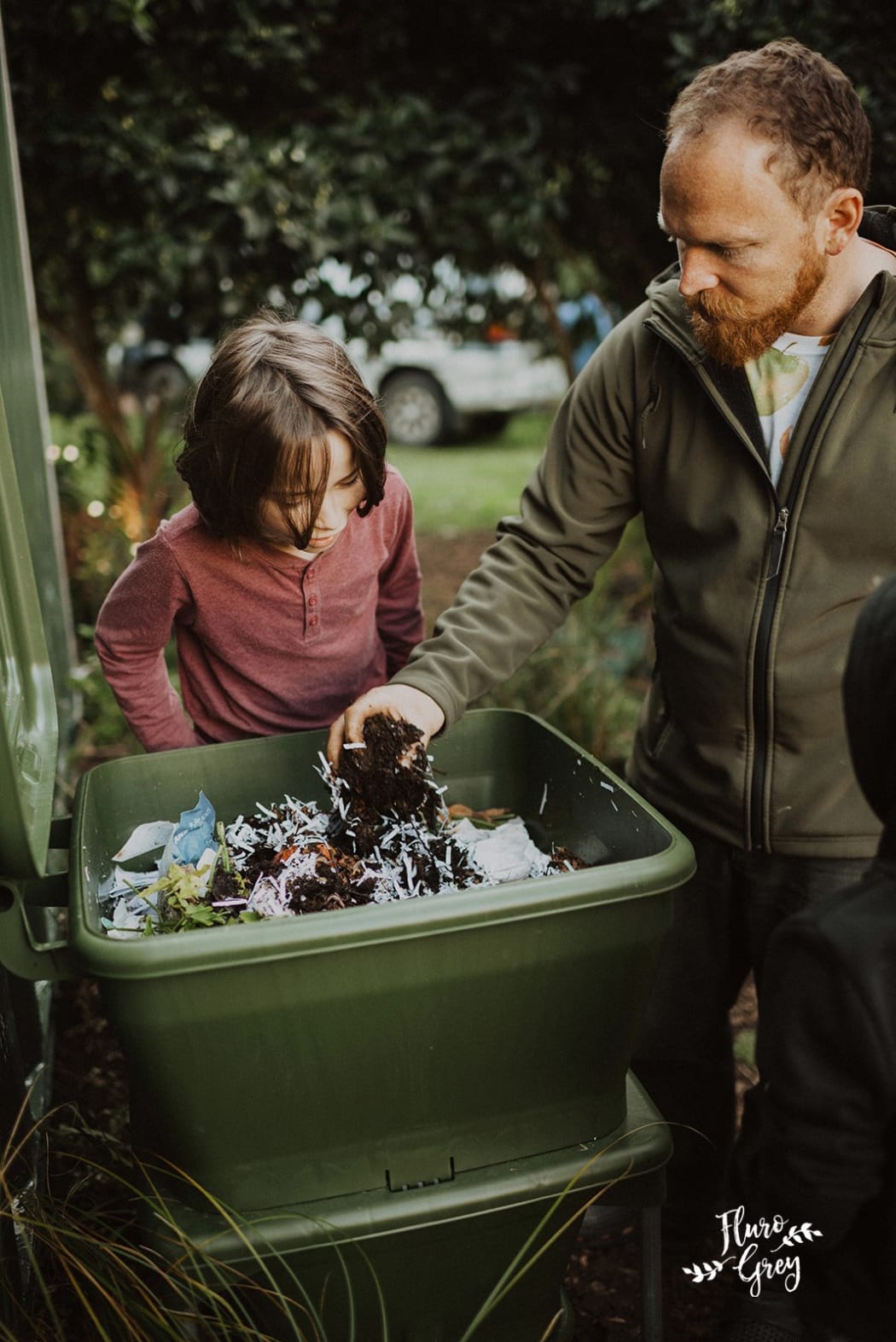 Why Waste founder Leo Murray demonstrating a worm farm.