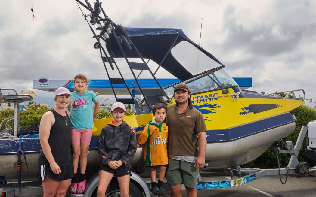 The Collins family went out on Waitangi Day to catch tuna and albacore, but ended up bringing in a striped marlin, instead.