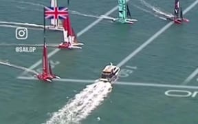A ferry cruising through the SailGP course as a number of boats were also out sailing.