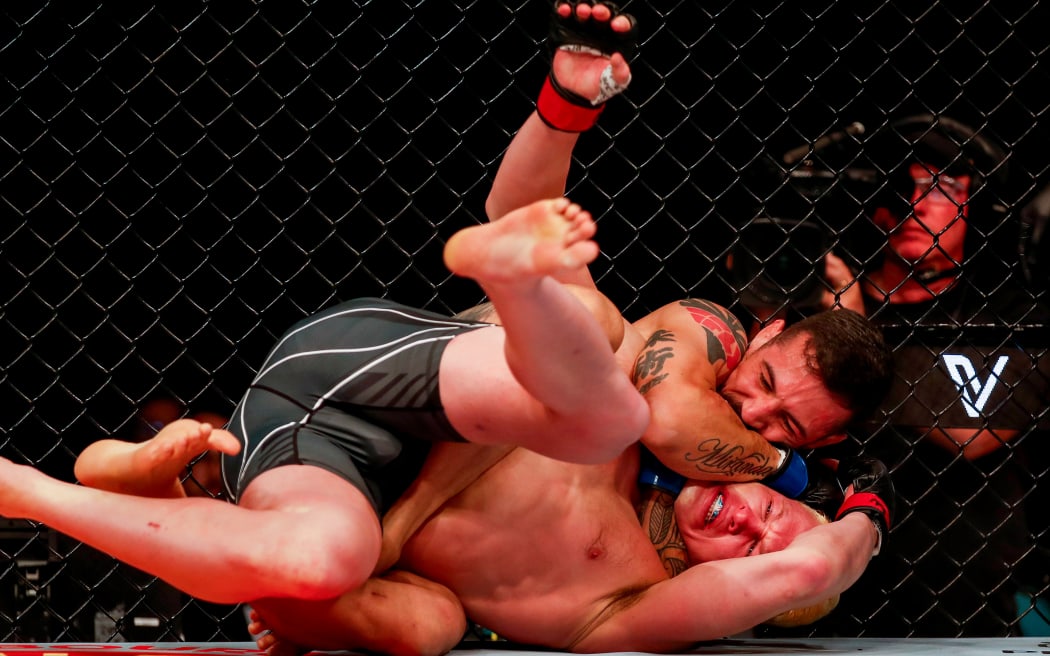 Gabriel Miranda stops Shane Young via a rear naked choke. UFC 293, Qudos Bank Arena, Sydney Olympic Park Australia, Sunday 10th September 2023.  Copyright Photo: David Neilson / www.photosport.nz