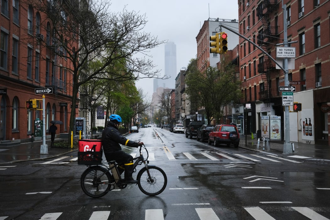 Streets stand nearly empty in the popular Manhattan shopping district of SoHo on 26 April 2020.