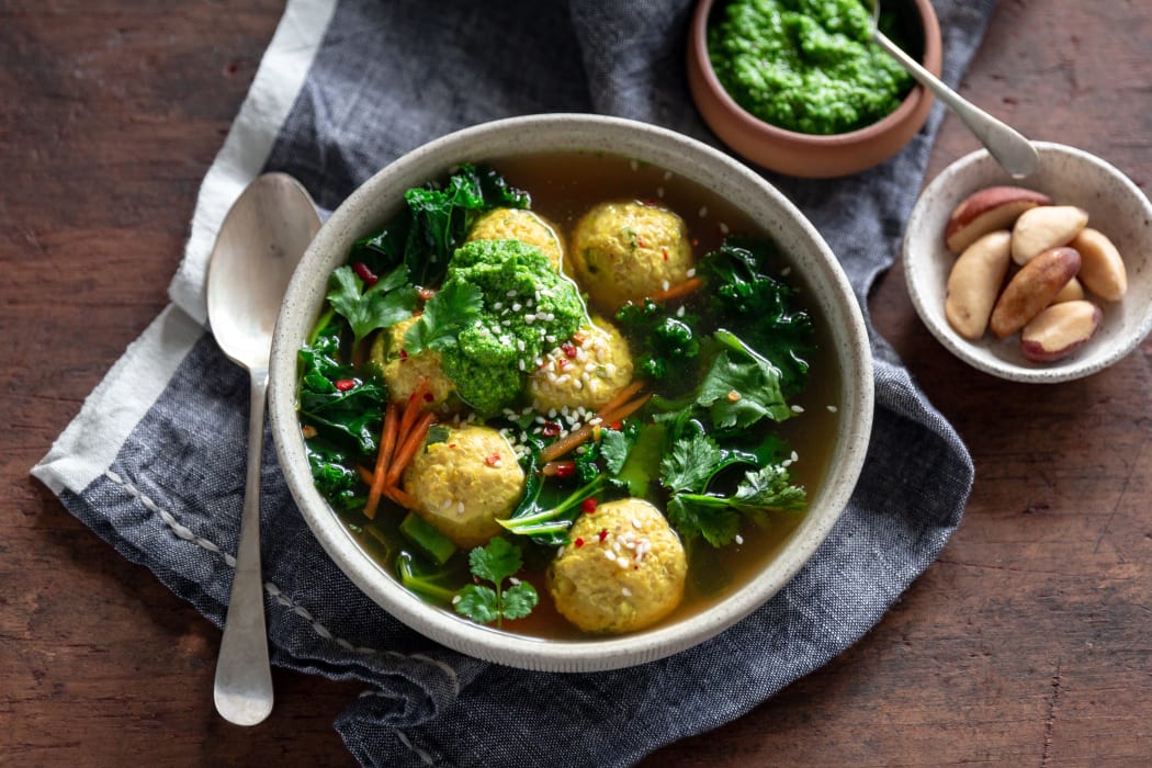 Turmeric and greens soup with chicken, quinoa and sesame dumplings