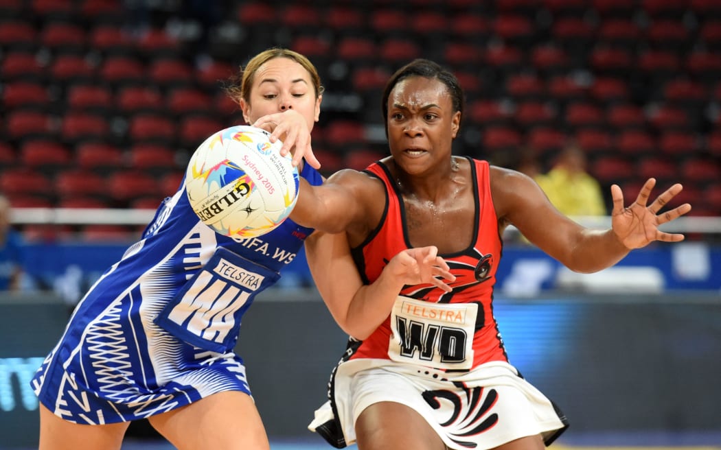 Samoa's Brooke Williams competes for the ball against Trinidad and Tobago at the Netball World Cup.